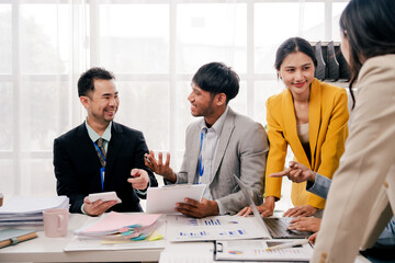 Brainstorming of young modern group. Team meeting to achieve goal. Business people discussing finance business and analysis. Teamwork concept in modern office. Calculating personal tax for client.