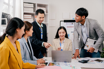 Brainstorming of young modern group. Team meeting to achieve goal. Business people discussing finance business and analysis. Teamwork concept in modern office. Calculating personal tax for client.