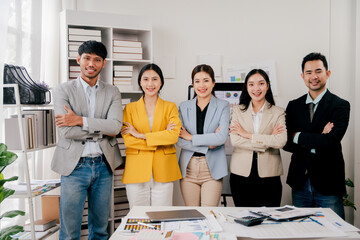 Brainstorming of young modern group. Team meeting to achieve goal. Business people discussing finance business and analysis. Teamwork concept in modern office. Calculating personal tax for client.