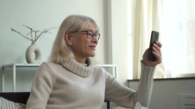 Using smartphones to communicate, demonstrating the simplicity and accessibility of technology for seniors.