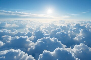 Aerial View of Fluffy White Clouds and Bright Blue Sky in a Serene Heavenly Landscape
