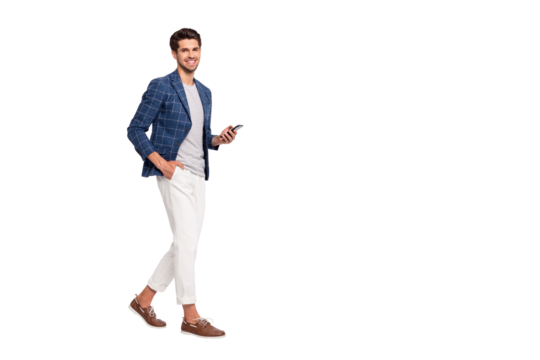 Full length body size view of nice attractive stylish trendy luxury cheerful cheery businessman wearing blue checked blazer using cell reading news feed isolated over light white pastel background