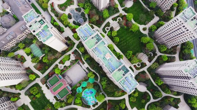 Aerial photographs of green cities, tall buildings in the city, residential areas, livable urban environments