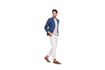 Full length profile side photo of pretty youth walk look wear blazer jacket pants trousers...