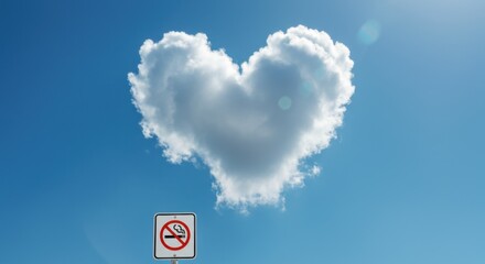 Heart Shaped Cloud in Blue Sky with No Smoking Sign Concept