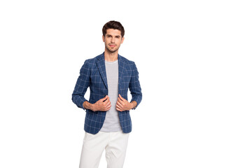 Portrait of gorgeous man touch his blue blazer wear checkered jacket pants trousers isolated over grey background
