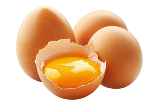 Whole brown eggs and cracked egg with yolk spilling out eggshell, isolated on white transparent background. Concept of Easter, food, fertility, and organic nutrition