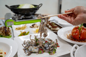 Korean food. Chopped live octopus