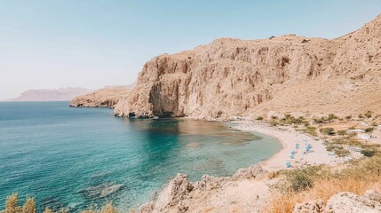 Obraz premium Picturesque coastal view of a secluded bay. A tranquil beach nestled within a dramatic cliffside setting