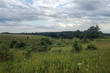 Dirt road in the countryside on a cloudy day