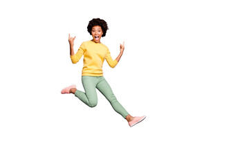 Lets rock! Full size photo of cheerful crazy mulatto girl fool on autumn spring holiday show horns true rocker sign wear yellow pullover green pants trousers isolated purple violet color background