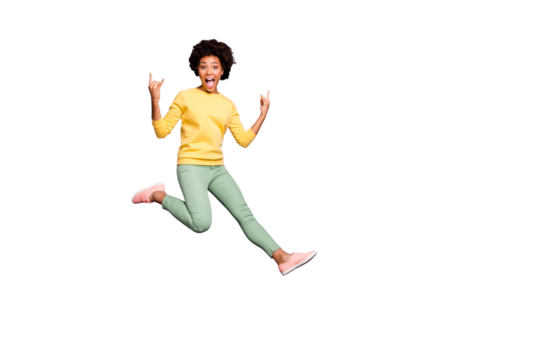 Lets rock! Full size photo of cheerful crazy mulatto girl fool on autumn spring holiday show horns true rocker sign wear yellow pullover green pants trousers isolated purple violet color background
