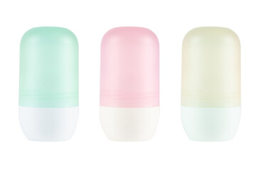 Green, pink and yellow deodorant bottles mockup isolated on white background