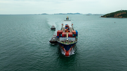 Fototapeta premium container ship carrying goods for international import export, business and industry regarding cargo transportation services to consumers and dealers by container ship around the world,