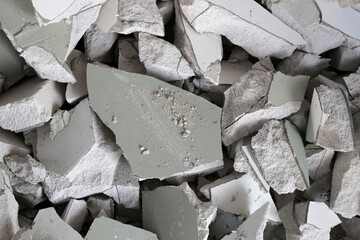 Broken concrete, Piles of lightweight construction bricks after house demolition