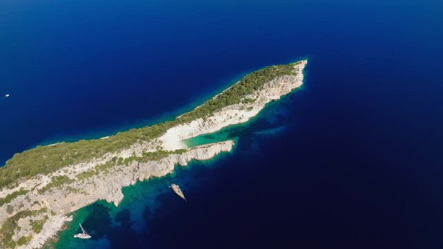 Aerial tracking along edge of Hulla Beach on Ithaca Island, Greece