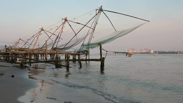Chinese fishing nets on the shore of Kochi, Kerala in India, Cheena vala or tangkul, traditional stationary lift net