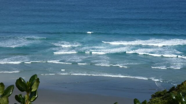 Beautiful transition from turquoise to deep blue ocean at Sandfly Bay Wildlife Refuge (Otago Peninsula, New Zealand)