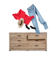 Clothes flying out of dresser on white background