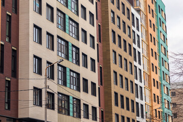 The residential building is painted in bright colors