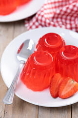 Fresh strawberry jelly of on wooden table