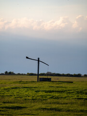 Hungarian nature landscape, Shadoof, Hortobagy, clouds,
