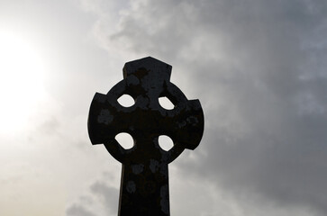 Memorial Cross Marker in Ireland on an Overcast Day