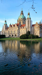 Fototapeta premium Stunning and Breathtaking Historical Architecture Set Against a Beautiful and Serene Water Backdrop Maschsee Hannover