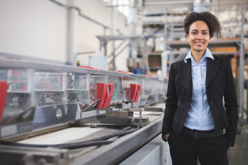 Female quality inspector in the factory