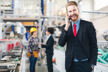 Portraits of quality control inspectors in a PVC factory. Shallow DOF. Developed from RAW;...