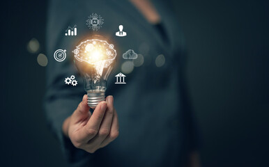 Businessman holding a light bulb. Network. Online business. Online business networking.. New ideas. Innovative ideas for online marketing.