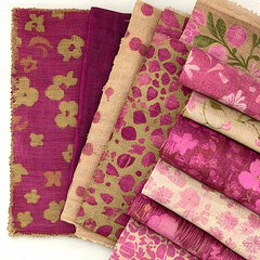 Pink and gold floral fabric swatches, arranged on white background, showcasing textile designs for crafting
