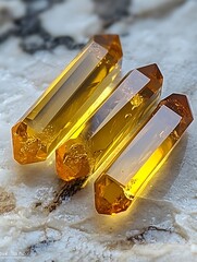 Three Amber Crystal Points on Stone