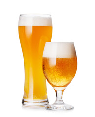 A glass of beer with a golden hue and frothy head, isolated on a clean white background