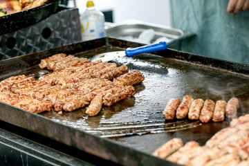 Grilled Meat Kebabs on Cooking Griddle