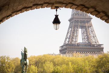 Dreamy spring Eiffel Tower from the metro bridge Bir Hakeim - Paris
