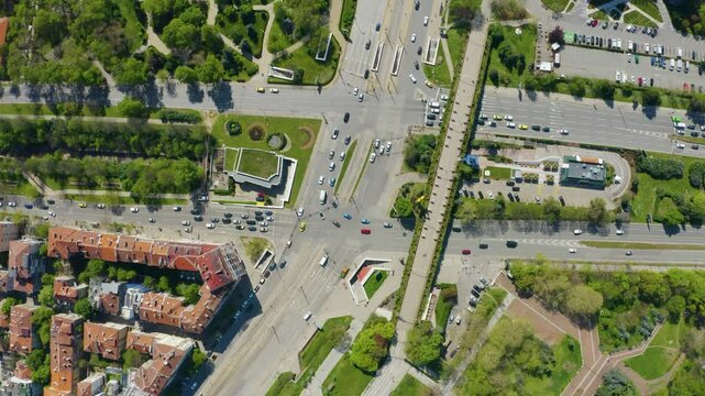 Aerial footage of the city of Sofia Bulgaria with traffic going on the streets and under a bridge