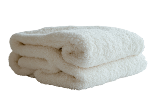 A folded fluffy white towel