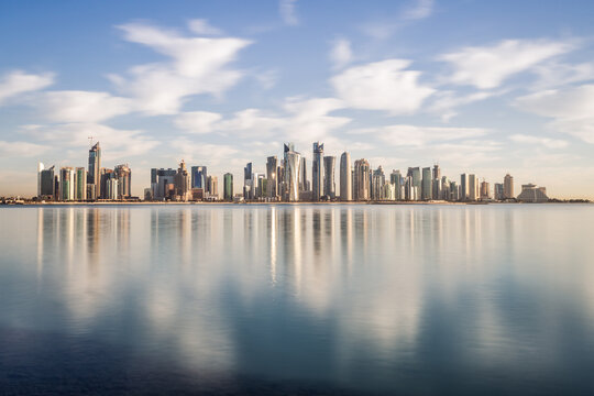 Doha skyline at sunrise from the Corniche, Qatar, Middle East