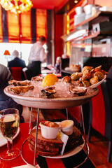 Oysters served on a platters surrounded by elegant dining atmosphere