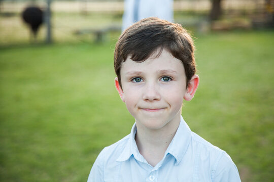 Portrait of a young 9yo boy outside - Powered by Adobe
