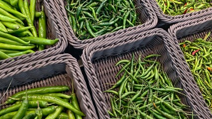 Fresh Green Chili Peppers in Natural Baskets