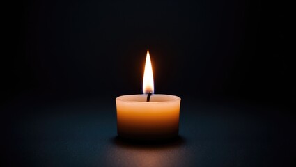Gentle glow of candlelight illuminating the abstract darkness