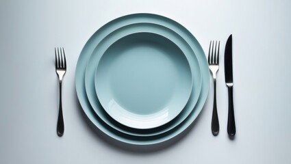 Stylish dinnerware arrangement on white background, top view