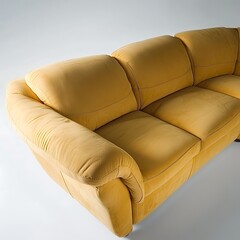 Obraz premium Yellow couch with a tan color