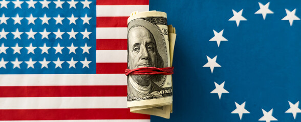 USD with the American flag arranged as a border with copy space, foreign exchange and currencies