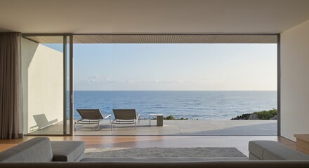 Sea View Living:  A contemporary living space with expansive glass doors that seamlessly connect the interior with a breathtaking ocean view representing all-inclusive resorts