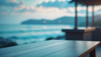 Empty wooden table with blurred sea background for presentation