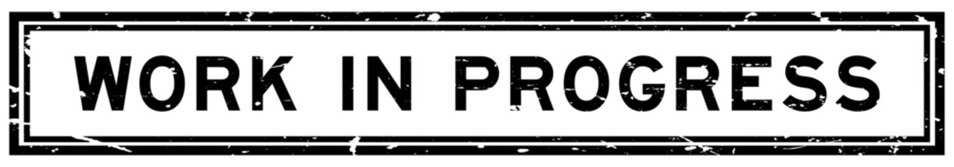 Grunge black work in progress word square rubber seal stamp on white bacckground