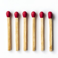 Six red tipped matches in a row on white background